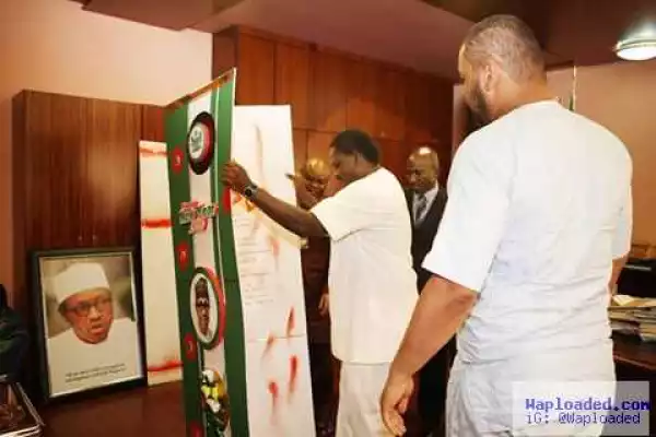 Photos: See The Giant Card Daar Communications Presented To President Buhari